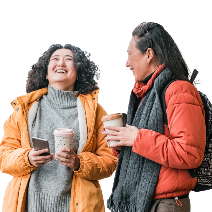 two women chatting over coffee